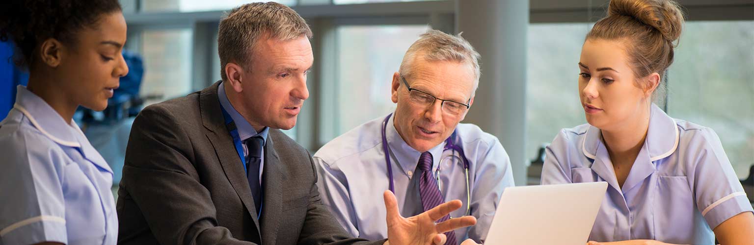 nhs staff in a meeting