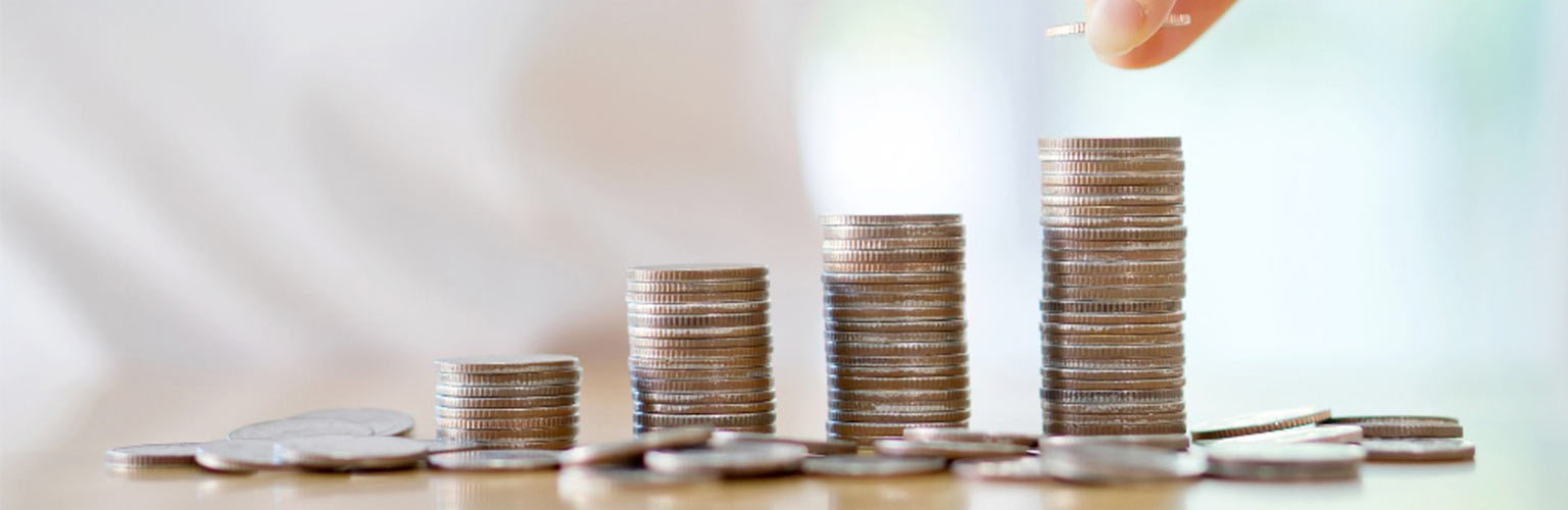 hand stacking coins