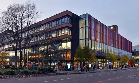 Exterior view of Alliance Manchester Business School on Oxford Road, Manchester.