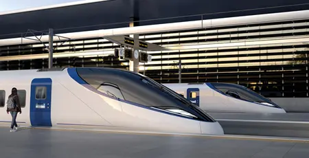 A passenger boards a train at a platform.