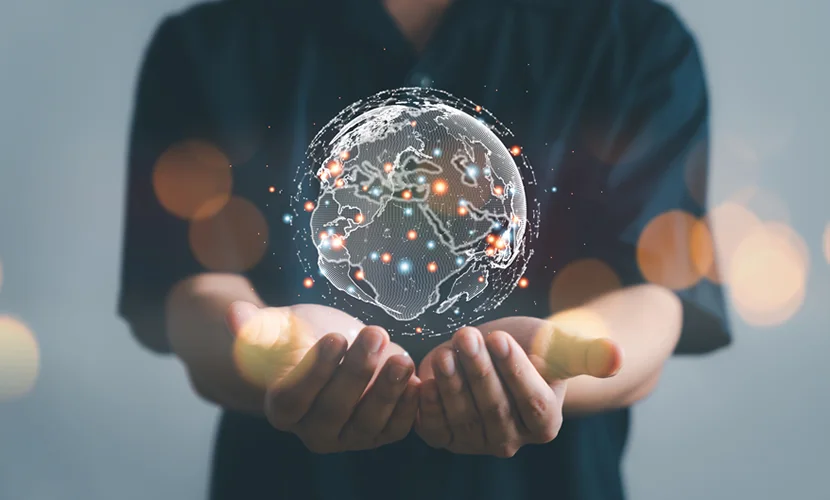 Hand of man holding earth planet