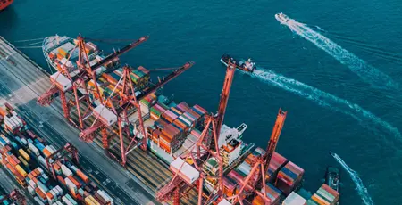 An aerial view of colourful containers in the ship terminal of Hong Kong Harbour