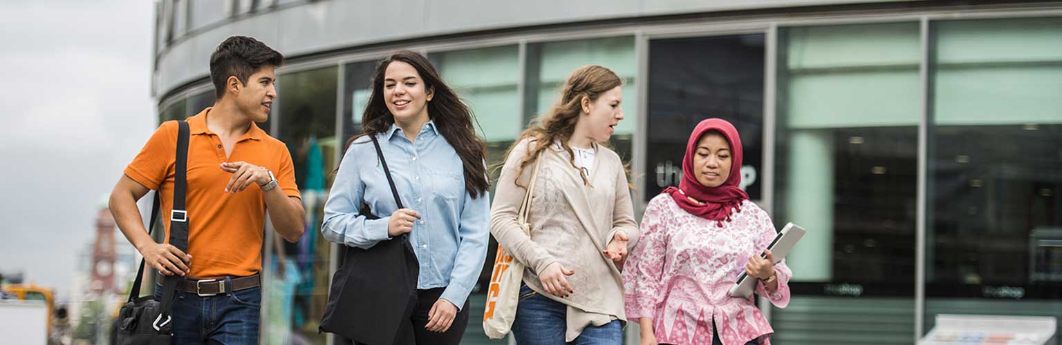 Master's students outside University Place