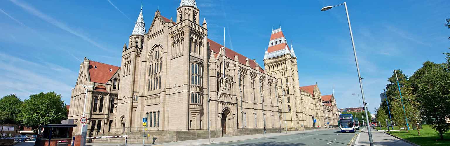 university of manchester arch tower under blue sky