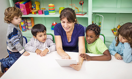 a teacher narrating a story on a tablet