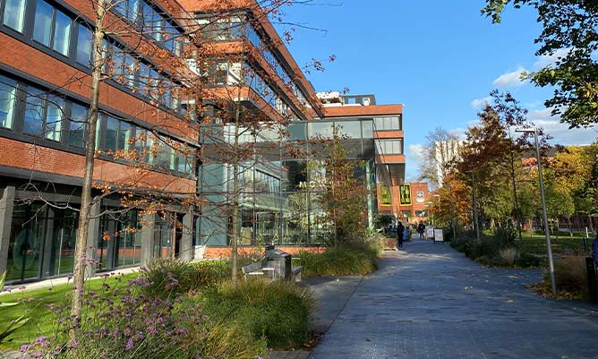 University Green retail outlets with a blue sky