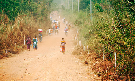 people walking down the road in Africa
