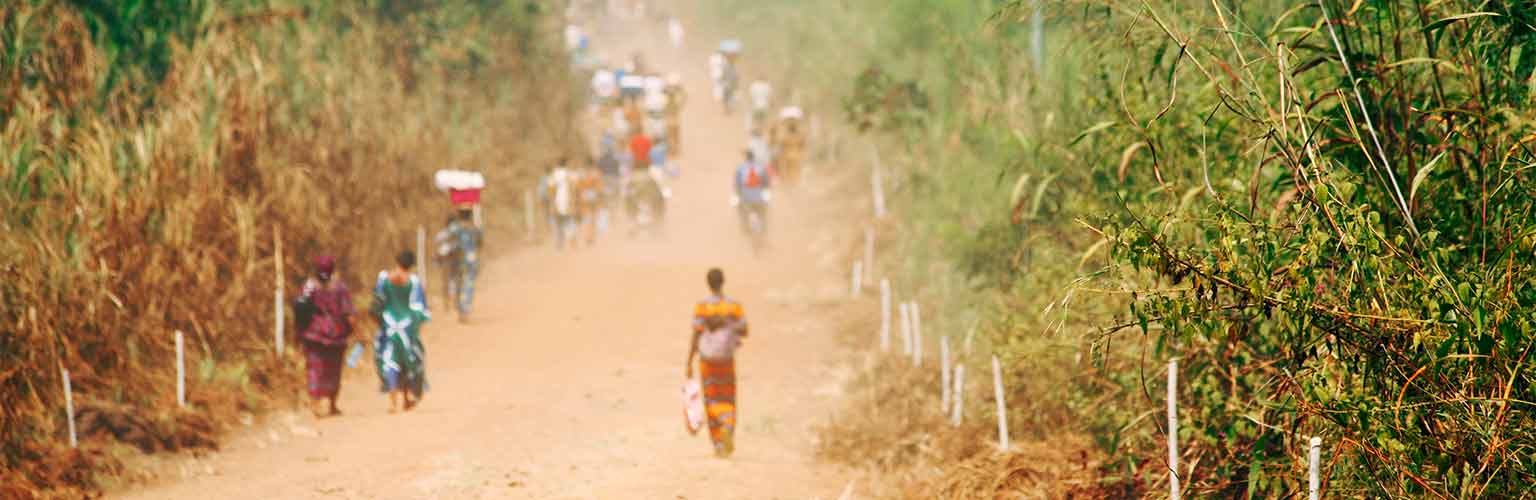 people walking down the road in Africa