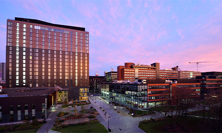 the alliance manchester business school building during a sunrise