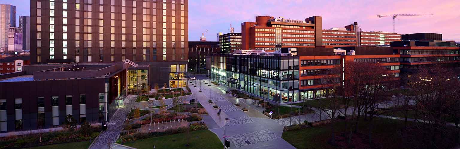 the alliance manchester business school building during a sunrise