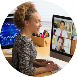 a woman keeping in touch with her friends using a laptop and camera