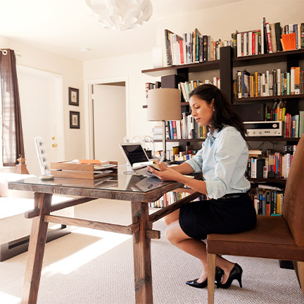 a woman working from her home office