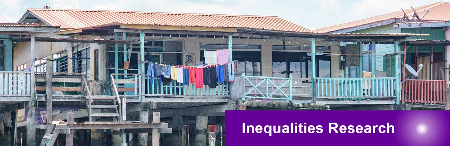 A house built on water with clothes outside it