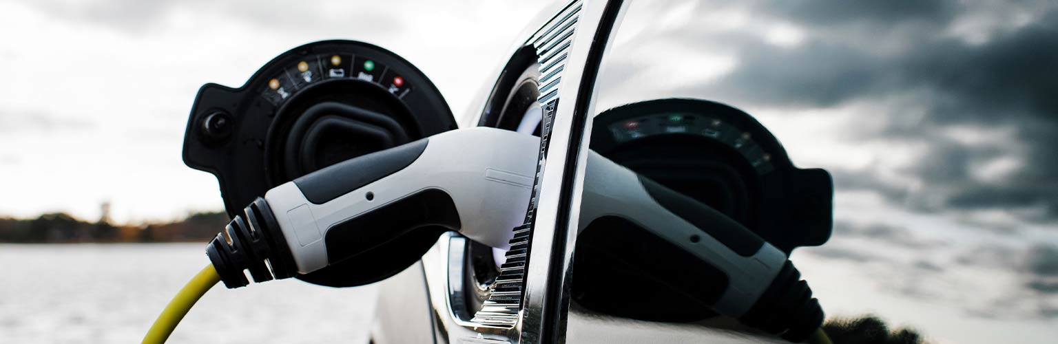 An electric vehicle at a charging station