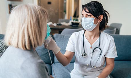 female nurse with female patient