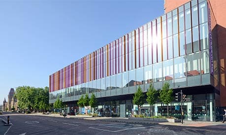 The Alliance Manchester Business School from Oxford Road looking towards University Place