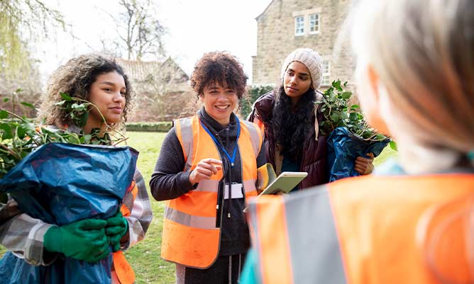 volunteers in high-vis jackets