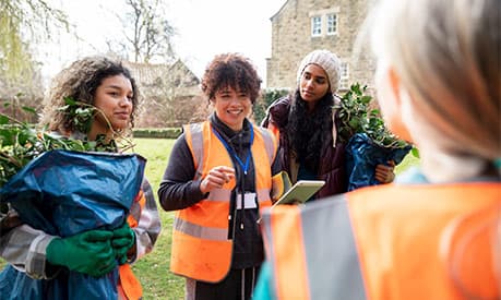 volunteers in high-vis jackets