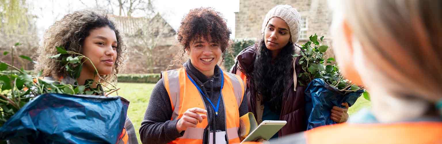 volunteers in high-vis jackets