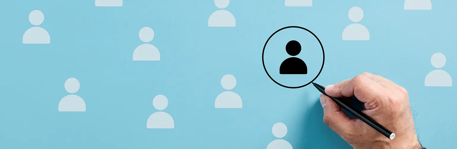 Male hand draws a circle around the employee icon.