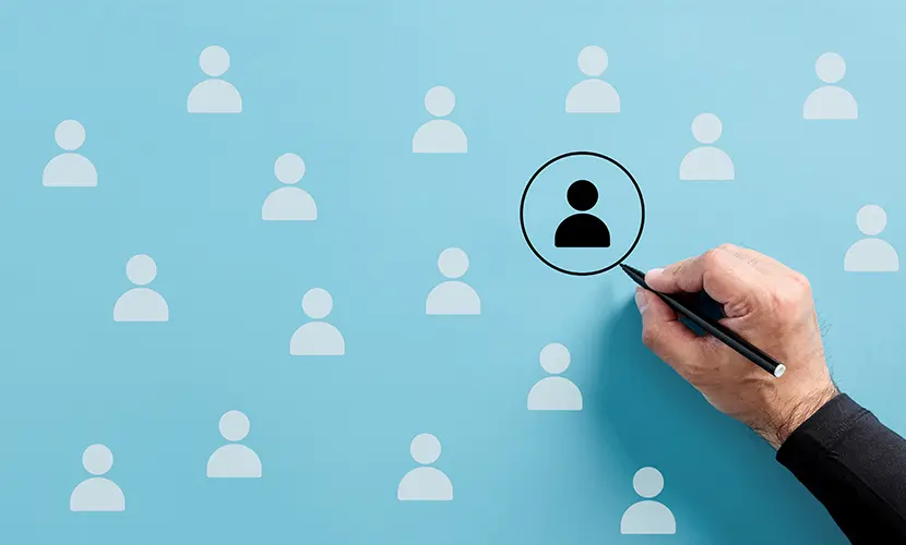 Male hand draws a circle around the employee icon.