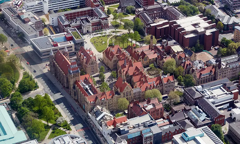 Aerial view of the buildings of the University of Manchester and Whitworth Hall.