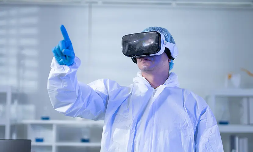 A healthcare professional in a white coat wearing a VR headset and interacting with the tool.