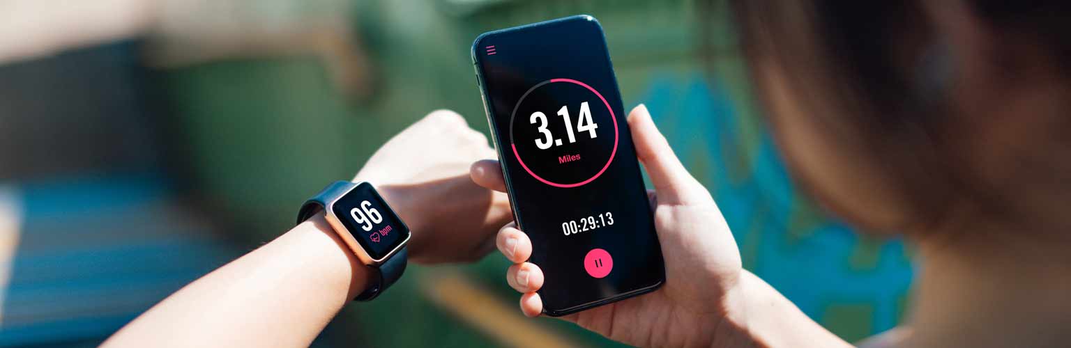 a health app on a phone and smartwatch