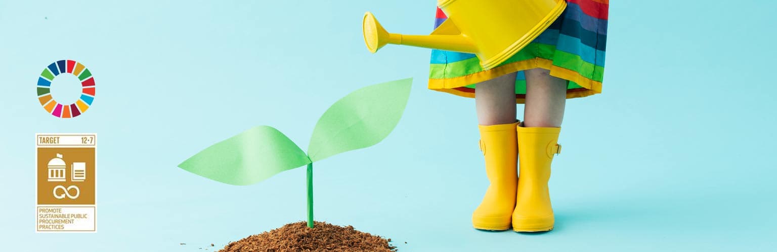 A child watering a plant with a blue background and the UN sustainable development goal logo in the bottom left of the picture