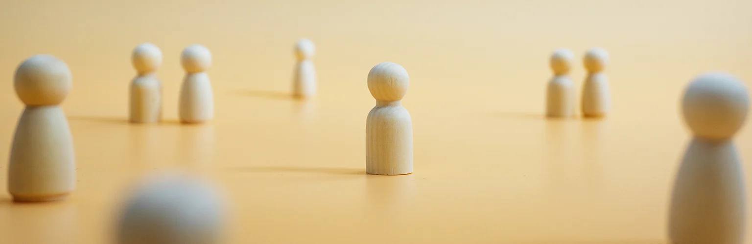 People represented by wooden figurines