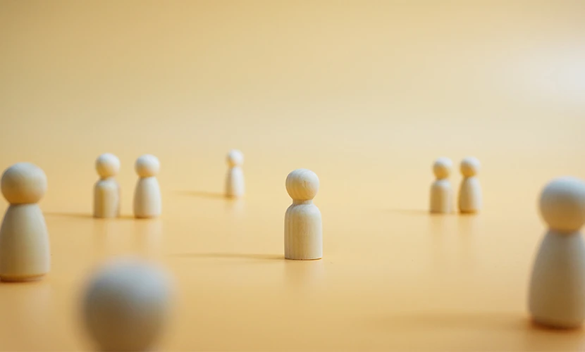 People represented by wooden figurines