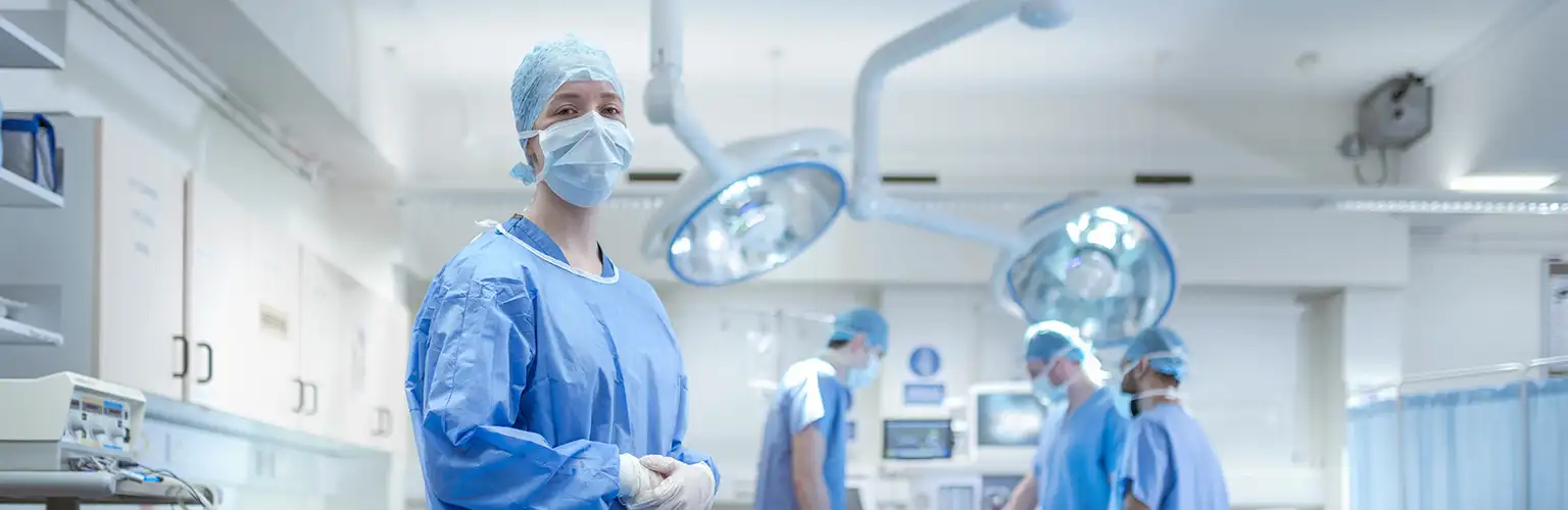 Portrait of specialist nurse in operating theatre.