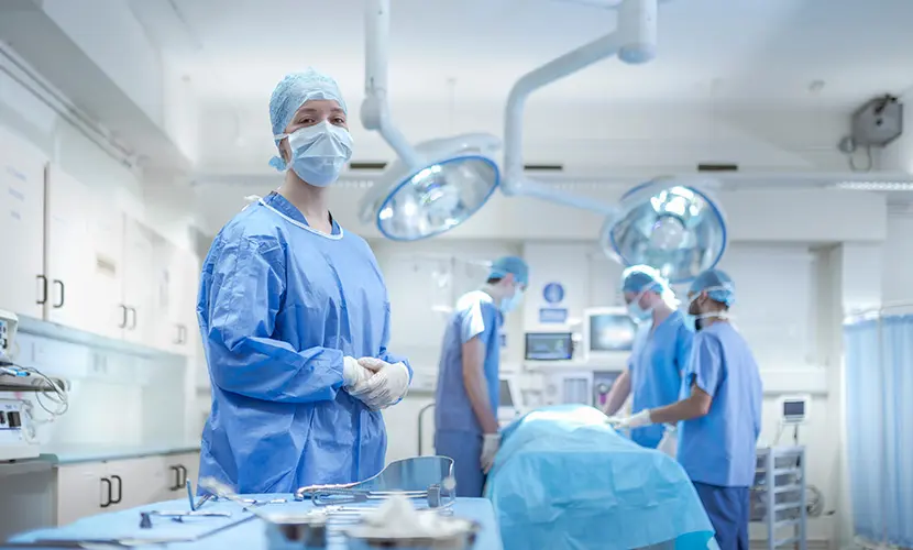 Portrait of specialist nurse in operating theatre.
