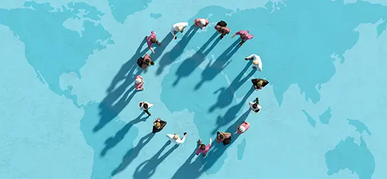 Illustration of people standing in a circle with a world map behind them.