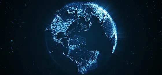 Digital image representing the Earth with land lit up in blue.