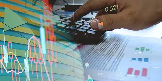 Graph and person using calculator