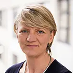 A professional headshot of Karen Bloor.