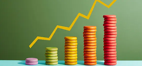 Five stacks of coloured coins showing an increase in funds.