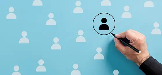 Male hand draws a circle around the employee icon.
